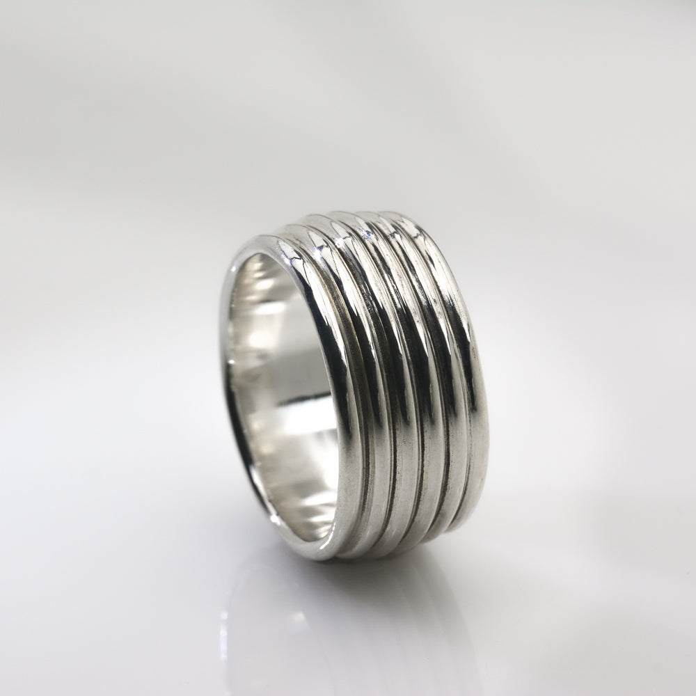 Revolutions: A Bold and Elegant Sterling Silver Ring with Six Loops - Nine Amulets 