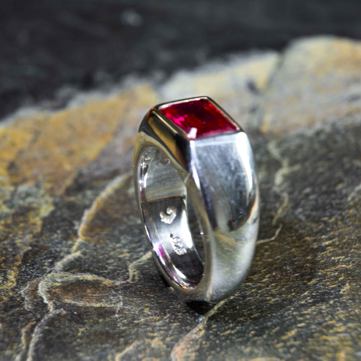 Ruby Silver Ring is a Thick and Bold Silver with a Beautiful Bright Ruby on Top - Nine Amulets 
