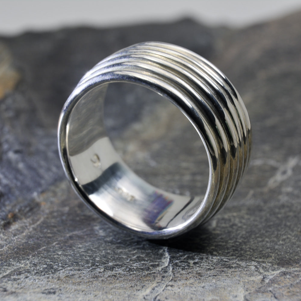 Revolutions: A Bold and Elegant Sterling Silver Ring with Six Loops - Nine Amulets 