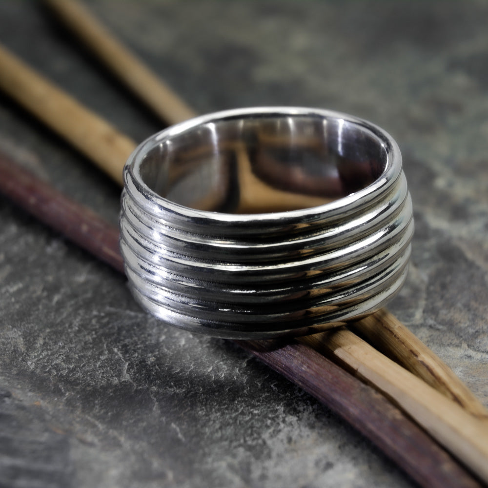 Revolutions: A Bold and Elegant Sterling Silver Ring with Six Loops - Nine Amulets 