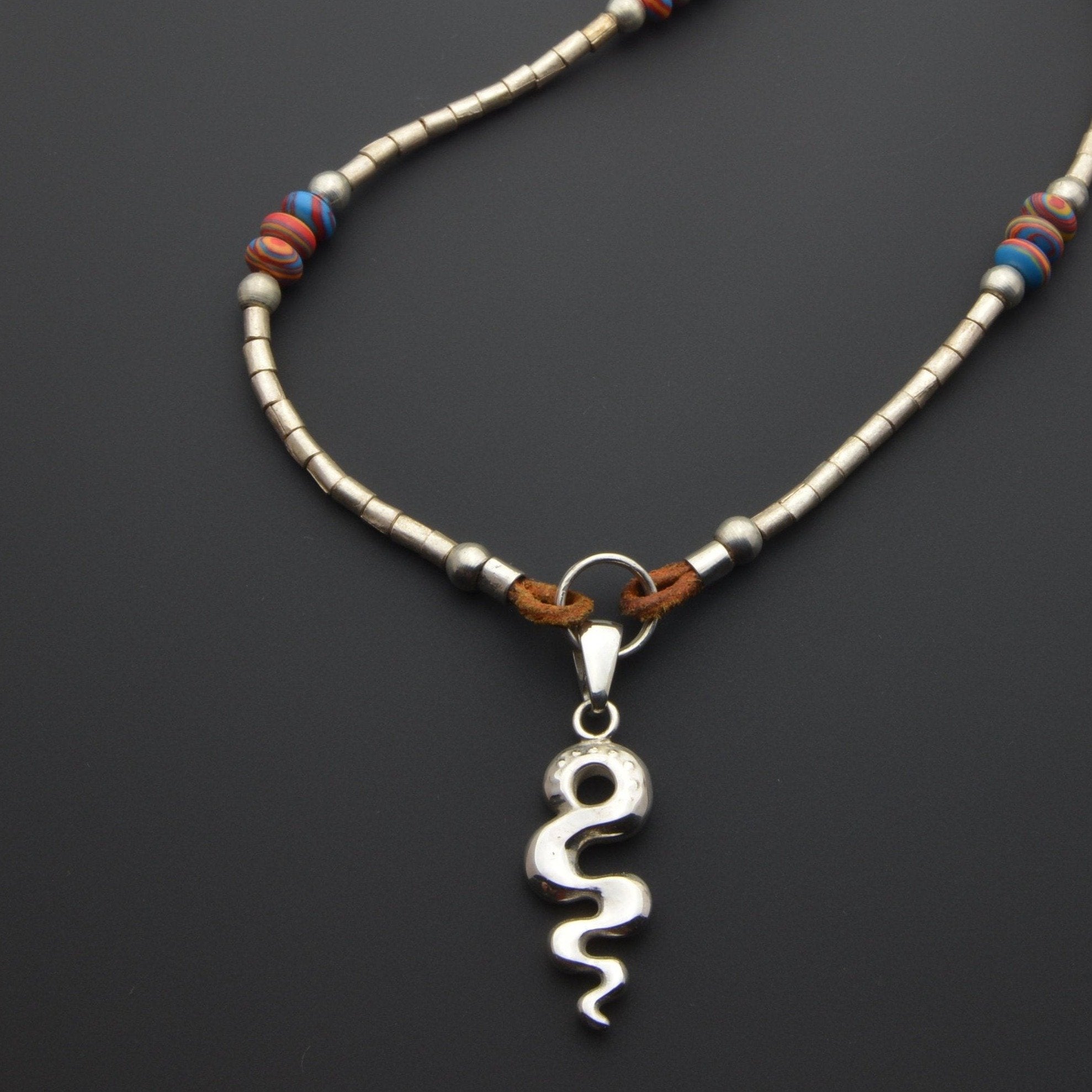 Colorful fordite beads and silver designer pendant